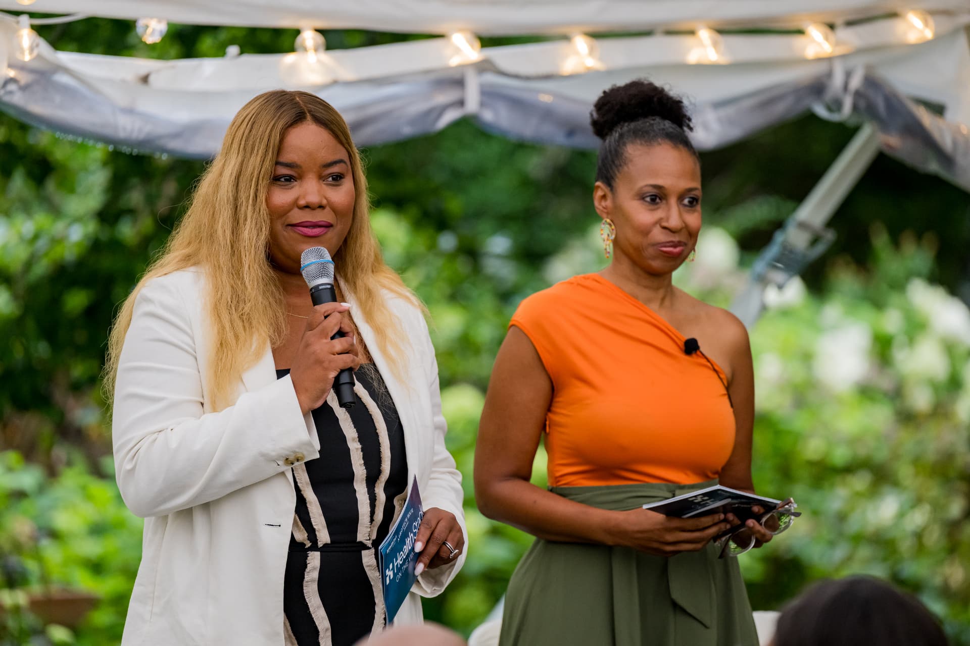 Hosts addressing the room at Afrotech HealthStack on the Vineyard