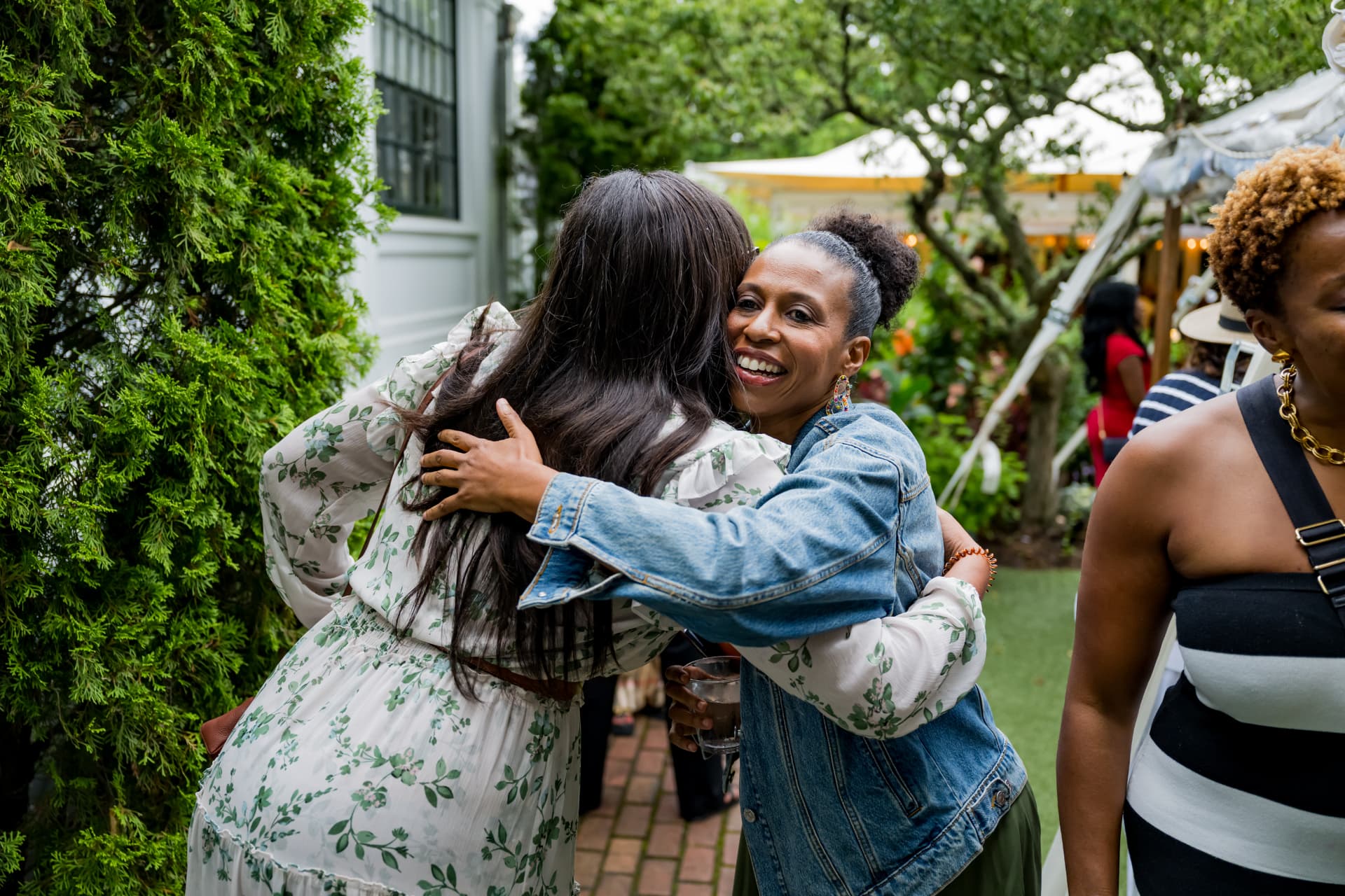 Warm greeting between guests at Afrotech HealthStack