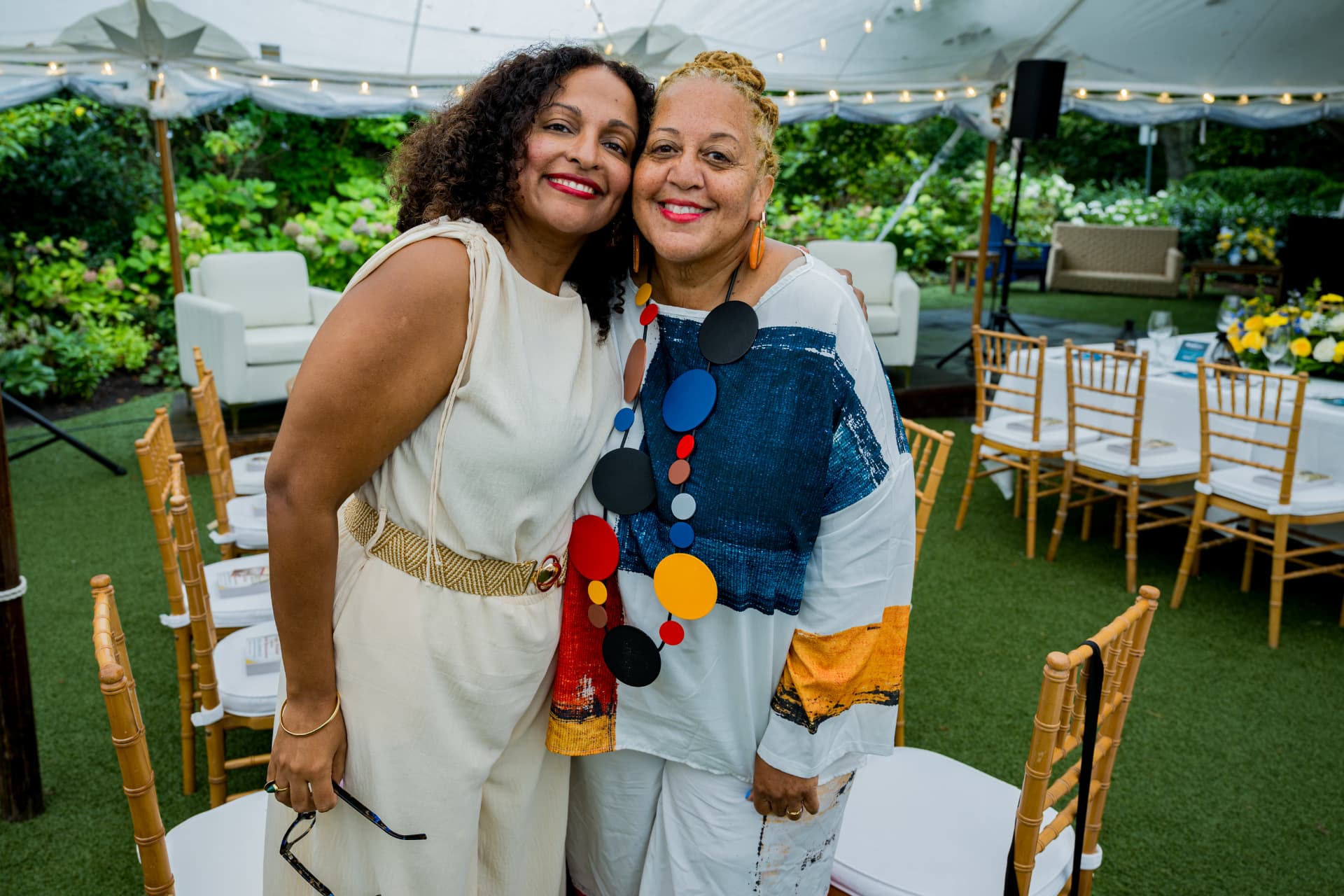 Two guests embracing at Afrotech HealthStack on the Vineyard