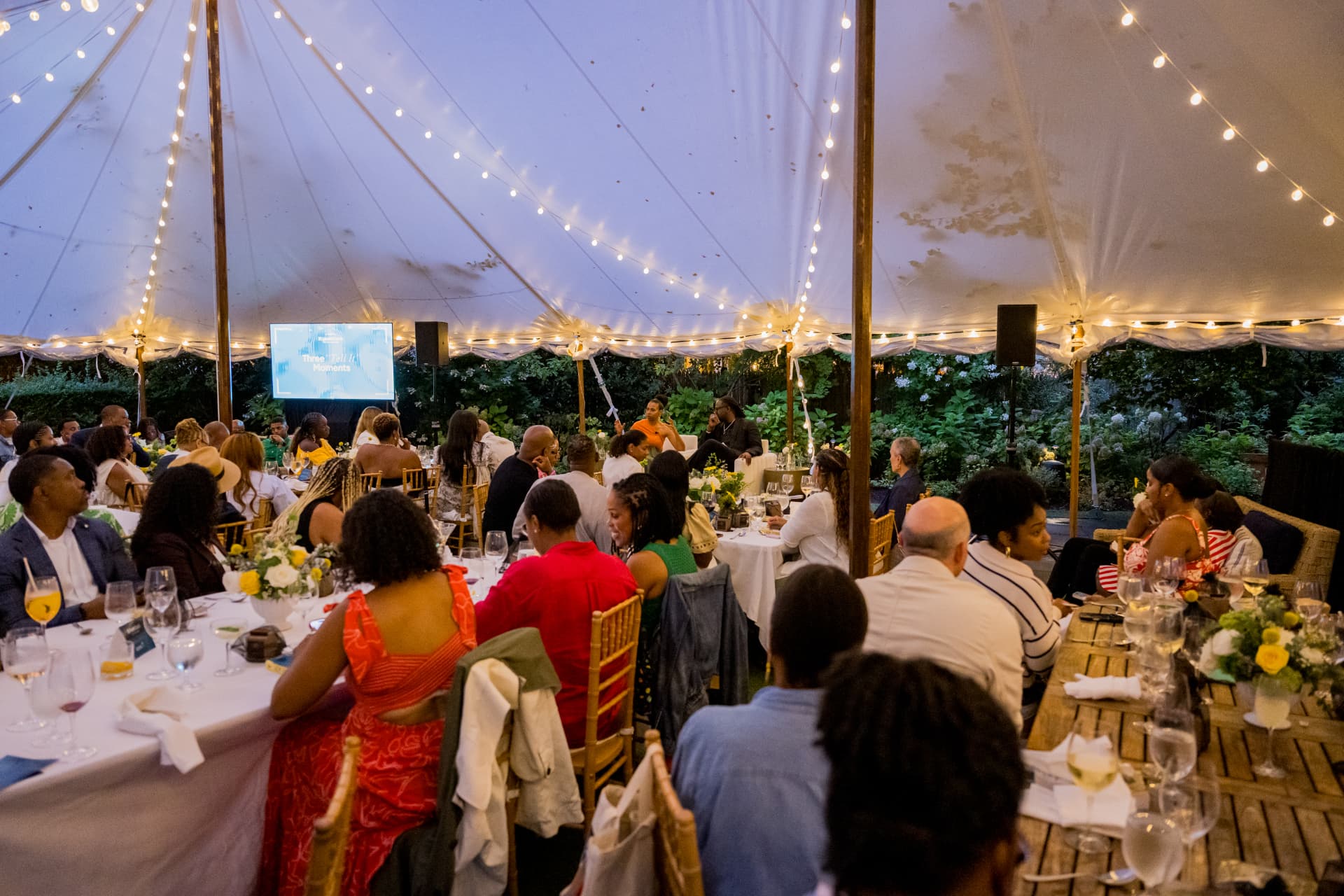 Program underway beneath the tent at Afrotech HealthStack