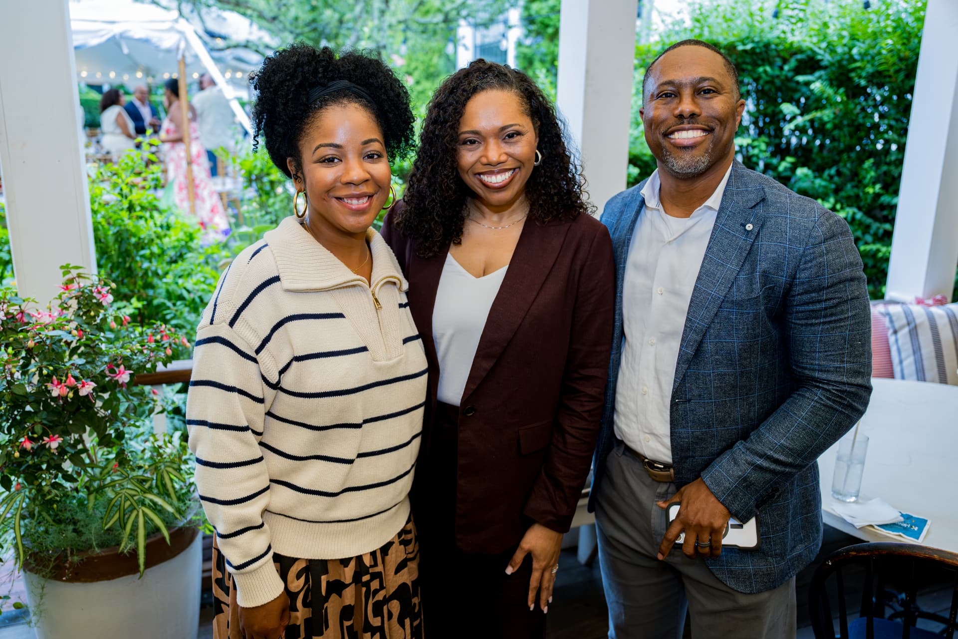 Guests together on the porch at Afrotech HealthStack