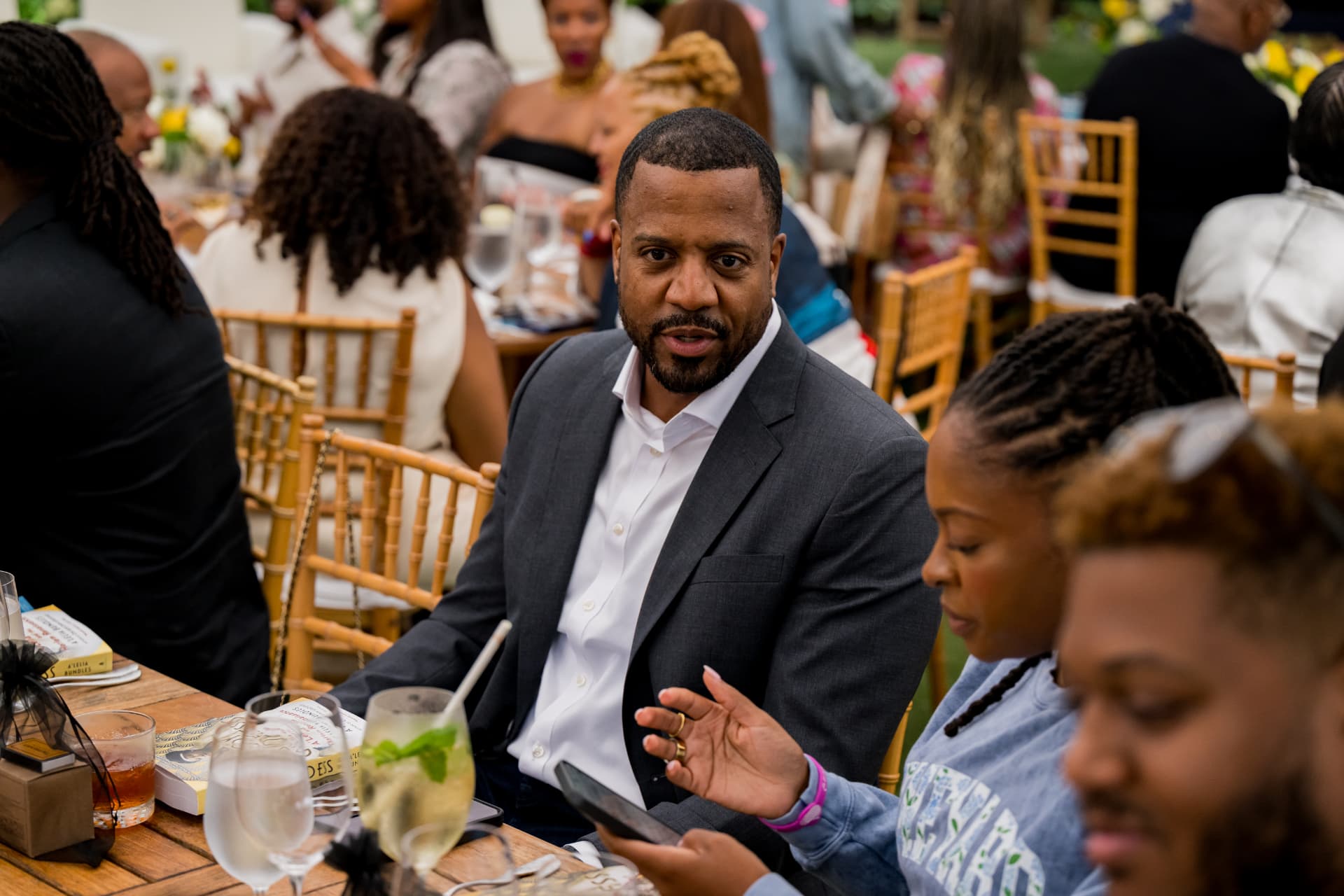 Guest speaking at the dinner table at Afrotech HealthStack
